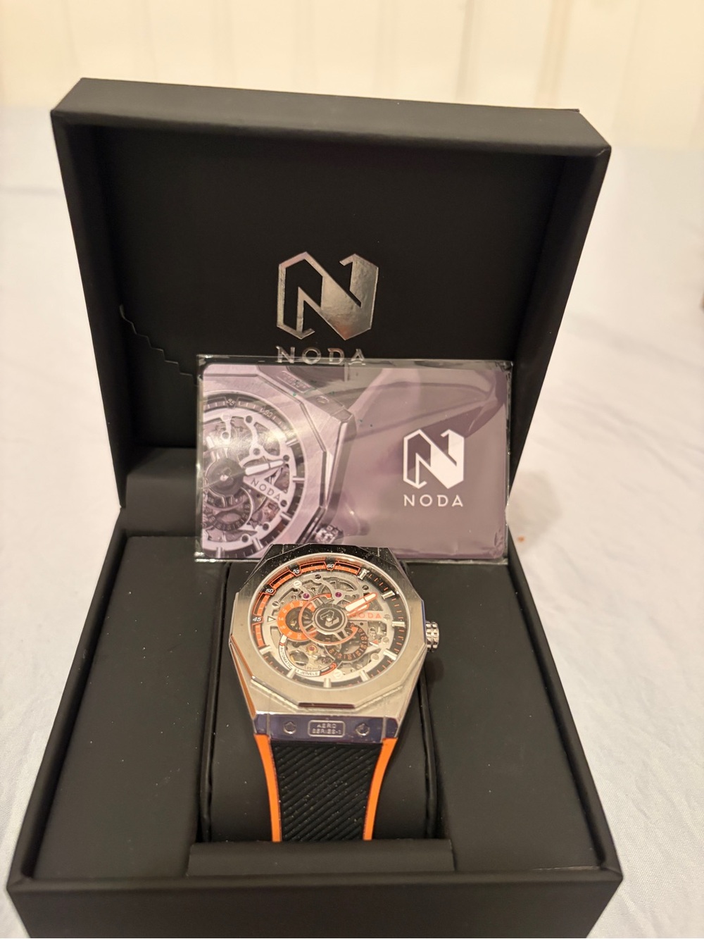 Noda Men's Skeleton Sport Watch in Black and Orange. New without tags.